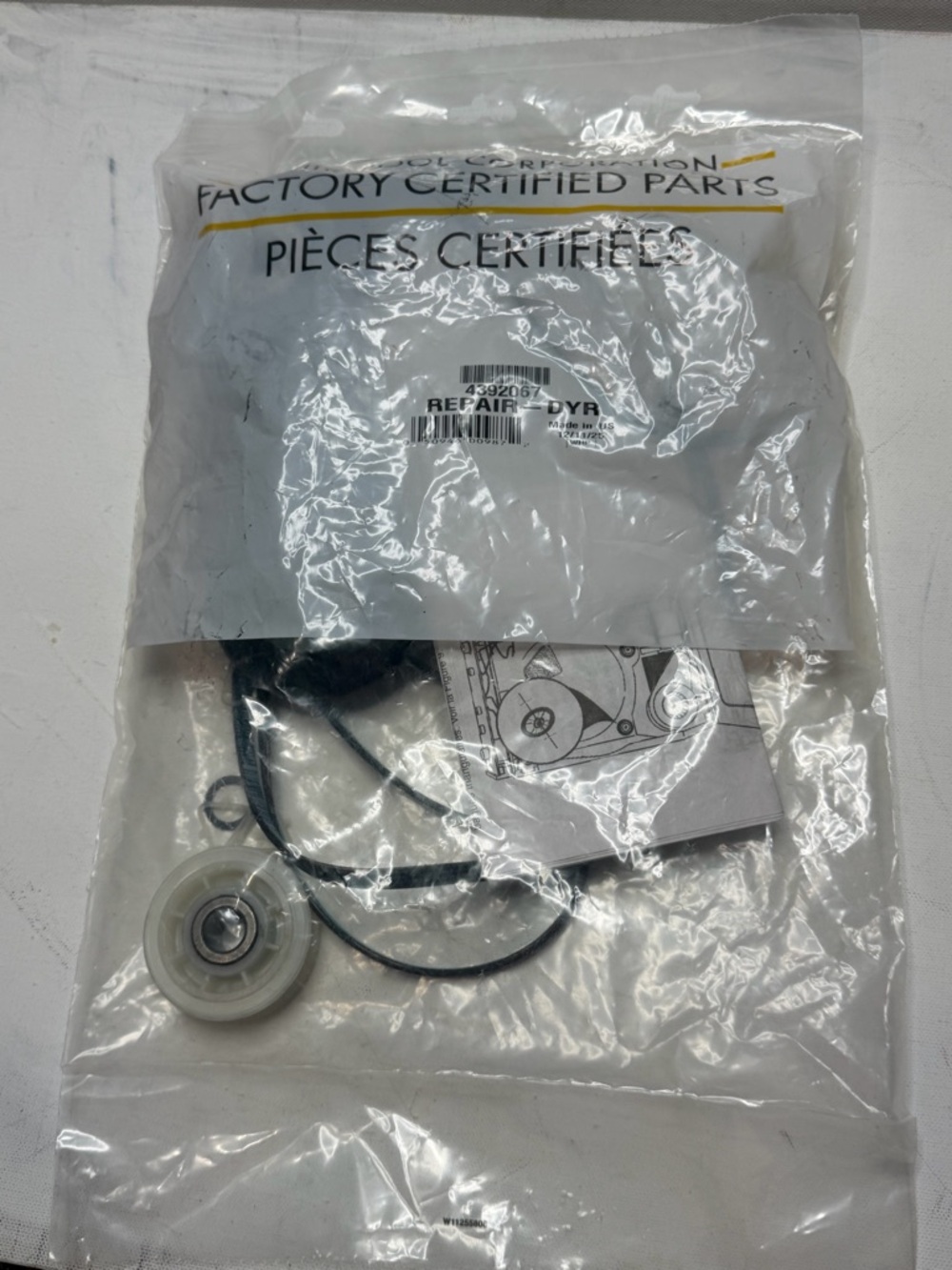 The image shows an original repair kit for a Whirlpool dryer.